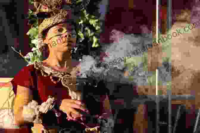Don Didio, A Maya Shaman Wearing Traditional Clothing, Performing A Ritual In The Rainforest. Gateway To The Dead Don Didio