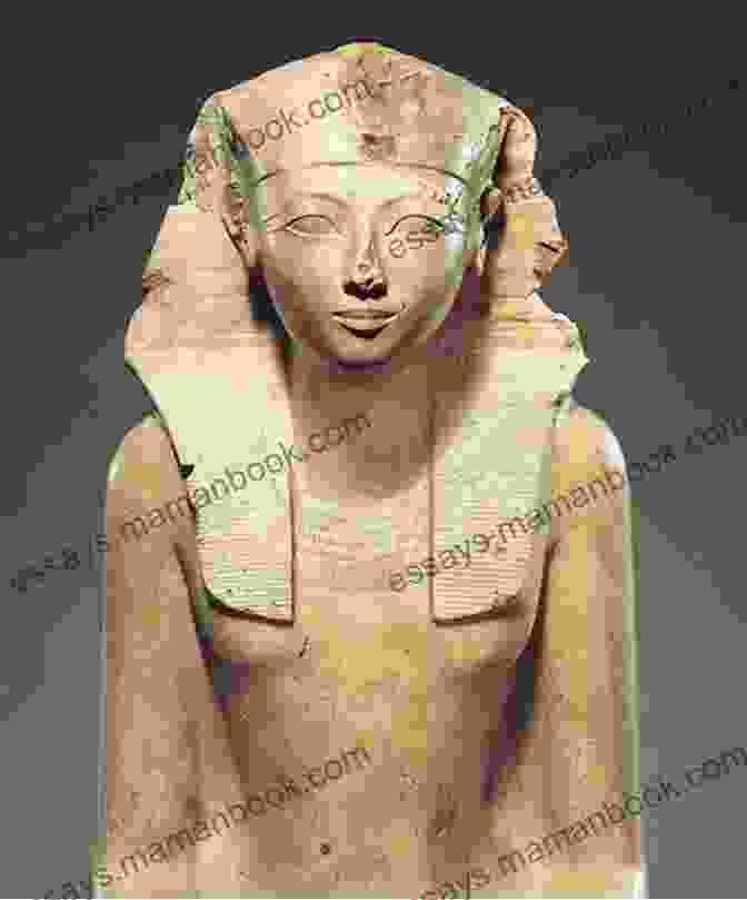 Statue Of Hatshepsut, A Powerful Female Pharaoh Of Ancient Egypt, Wearing A Royal Headdress And Holding A Staff Of Authority. SUMMARY AND REVIEW OF WHEN WOMEN RULED THE WORLD BY KARA COONEY